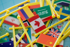 image showing a group of small, plastic flags from countries across the world